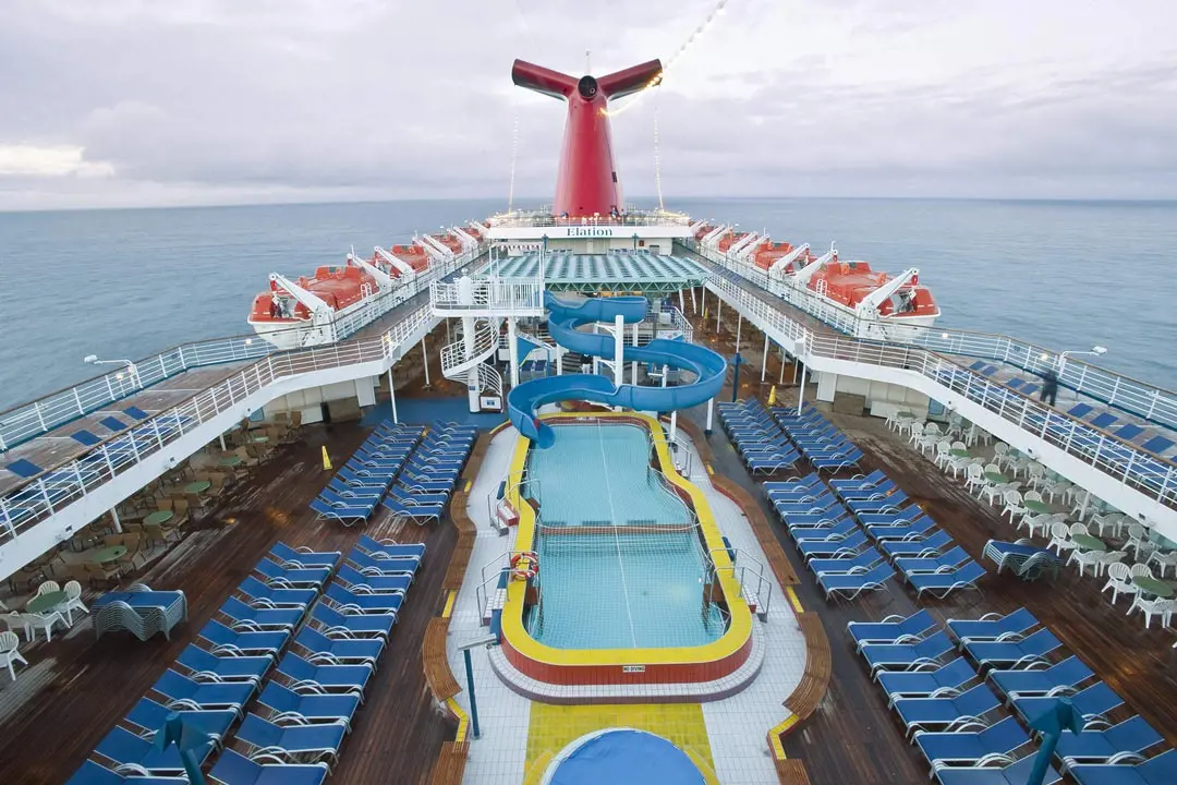 Carnival Elation has a small pool area surrounded with sun decks