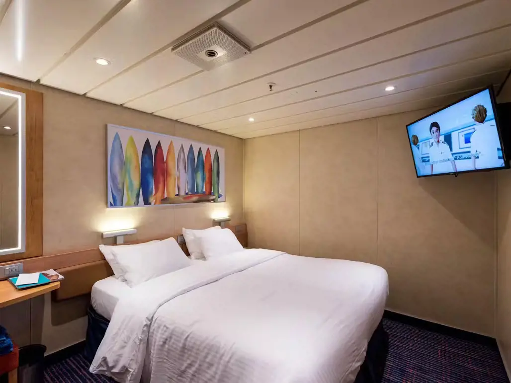 Carnival Elation interior rooms features a flat led TV