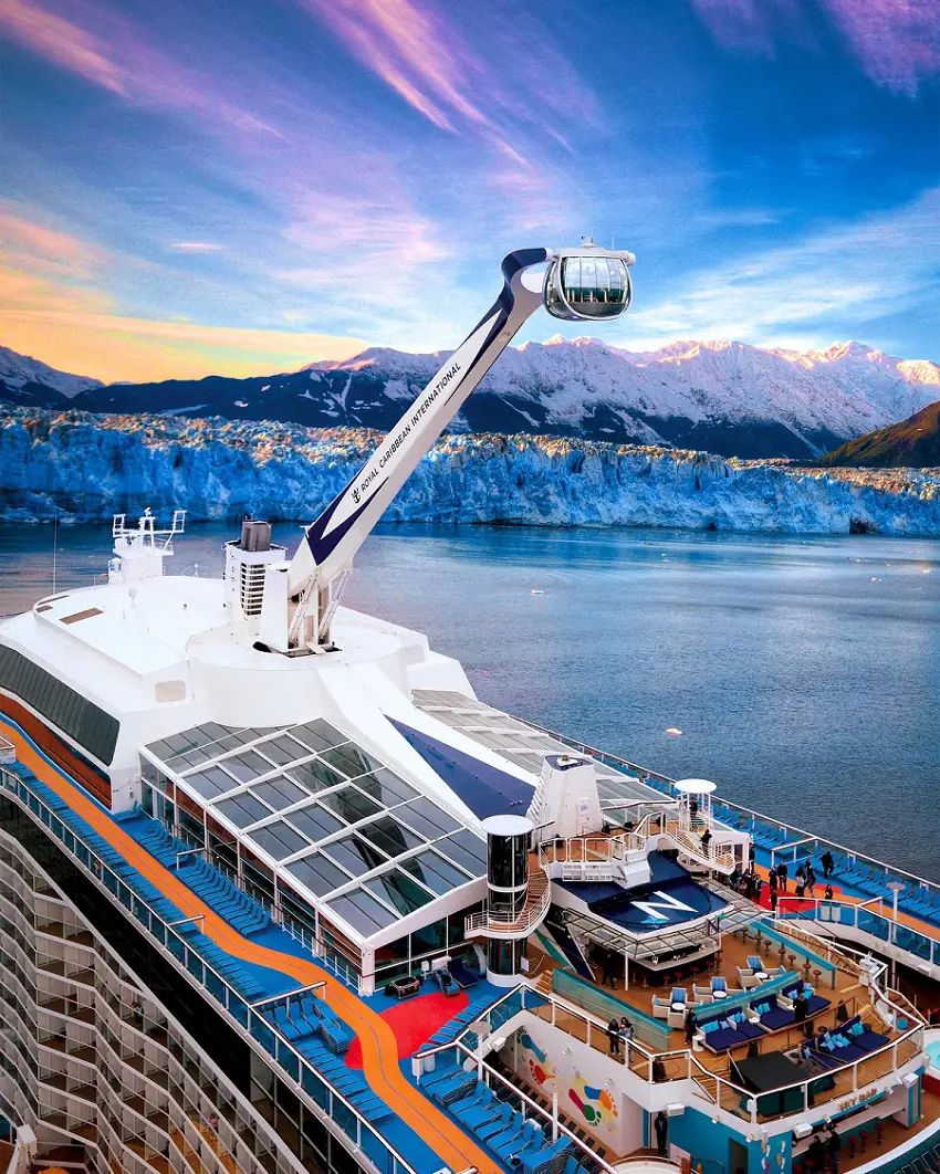 Quantum of the Seas pictured with spectacular mountain views in Alaska