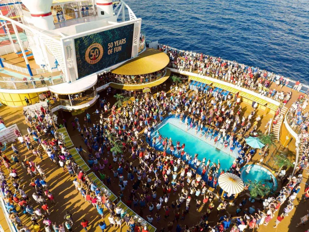 A picture of party taken during the 50th birthday celebration of Carnival Cruise.